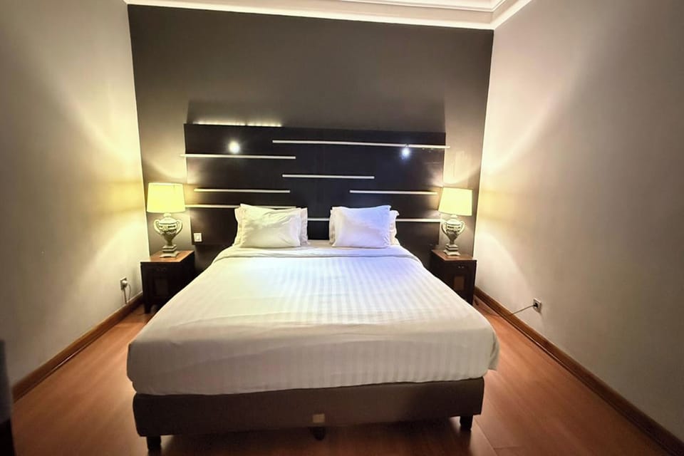 Deluxe Double Room | Blackout drapes, iron/ironing board, free WiFi, bed sheets