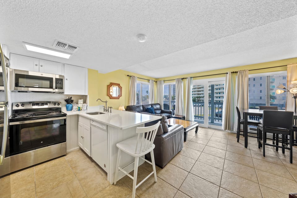 Signature Condo, 2 Bedrooms, Patio, Beach View | Private kitchen | Coffee/tea maker, fridge, microwave, oven