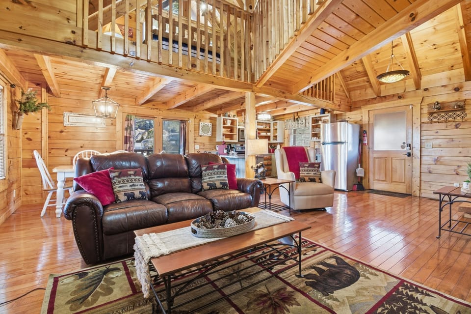 Signature Cabin, 3 Bedrooms, Balcony, Mountain View | Living room | 32-inch Smart TV with cable channels, fireplace, books