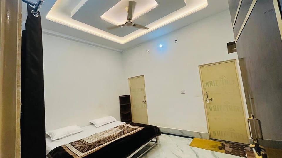 Deluxe Double Room, City View | In-room safe, desk, laptop workspace, blackout drapes