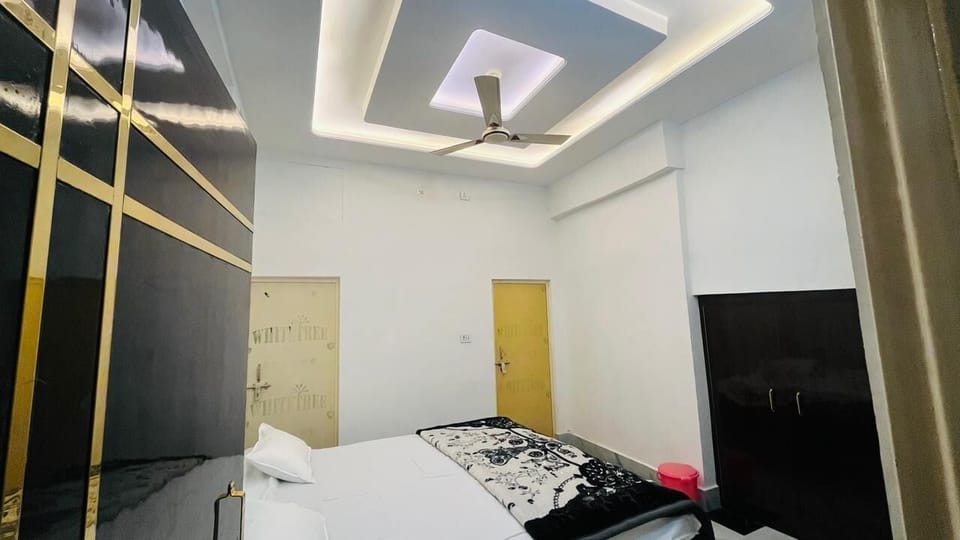 Deluxe Double Room, City View | In-room safe, desk, laptop workspace, blackout drapes