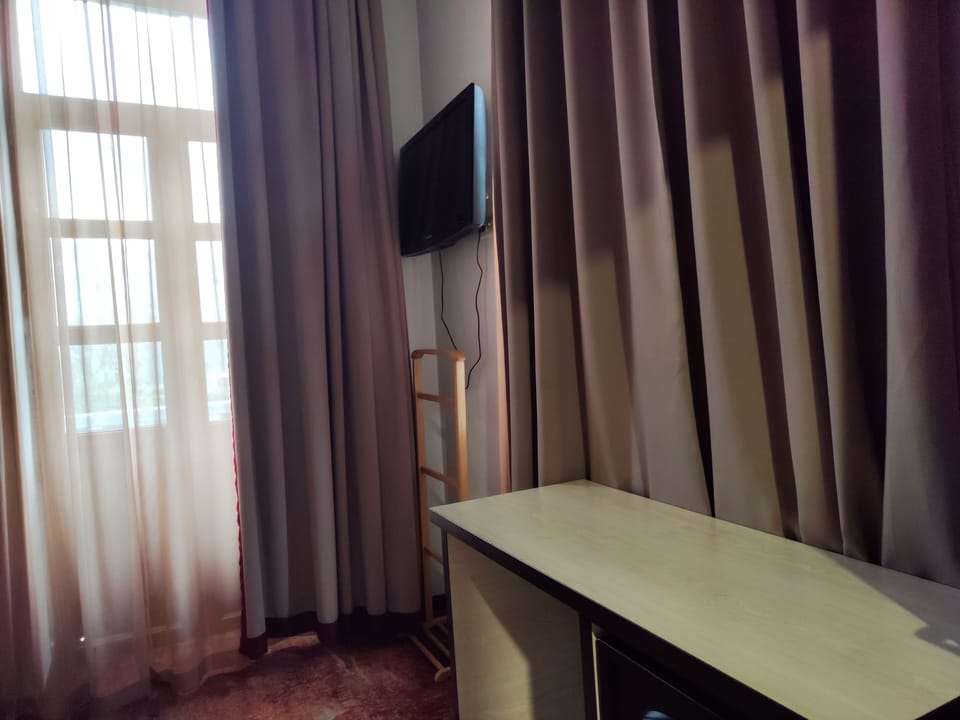 Luxury Suite, Balcony, Mountain View | Television