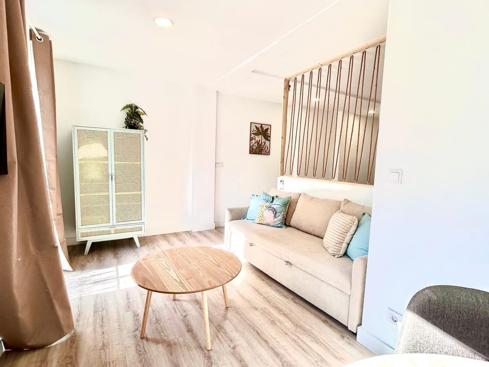 Deluxe Apartment, Balcony, Courtyard View | Living area | Flat-screen TV