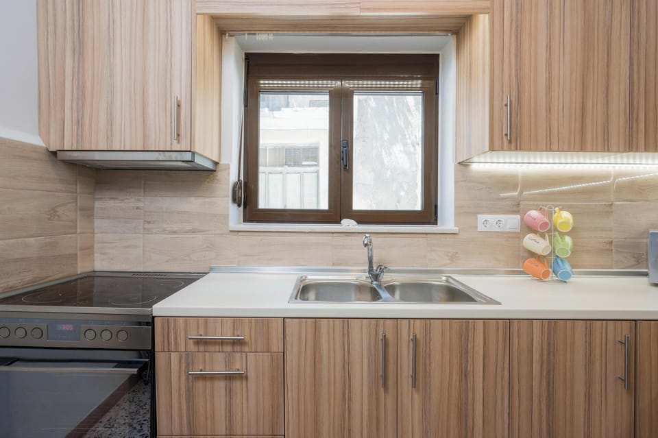 Apartment, Balcony, Sea View | Private kitchen | Full-size fridge, microwave, oven, stovetop