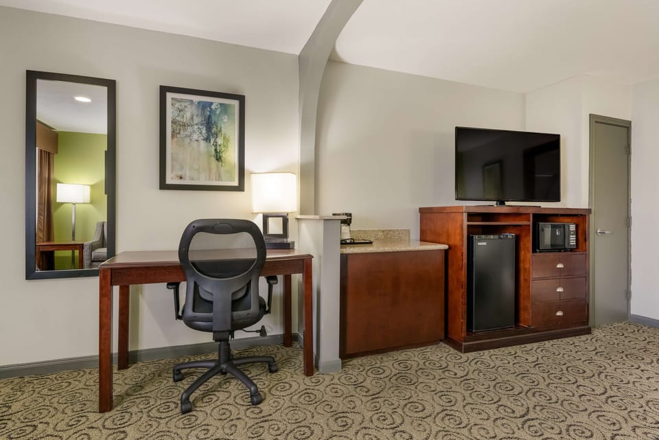 Individually furnished, desk, laptop workspace, iron/ironing board