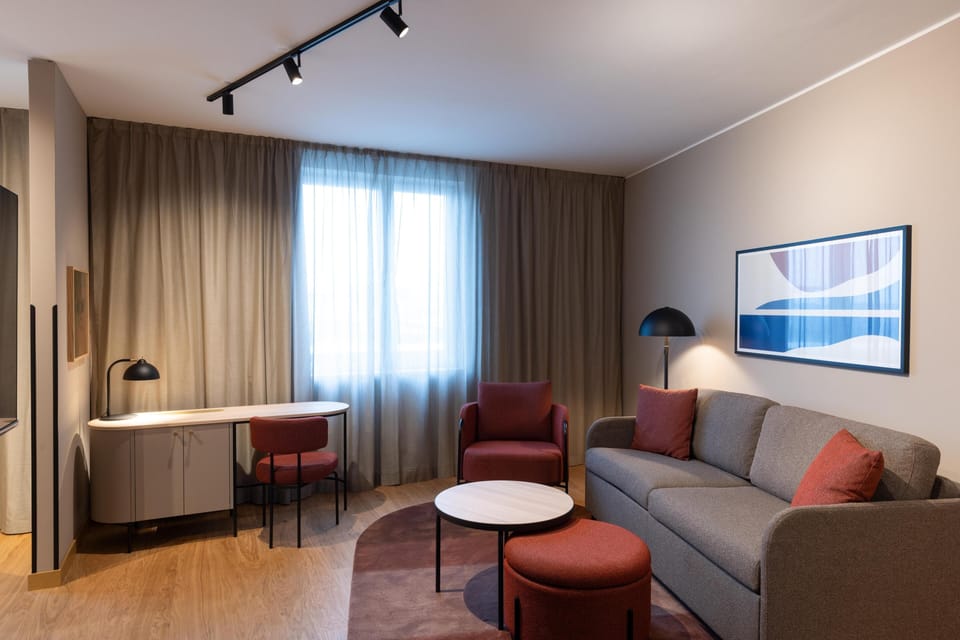 Master Suite with access to lounge "Living Room" | In-room safe, laptop workspace, blackout drapes, iron/ironing board