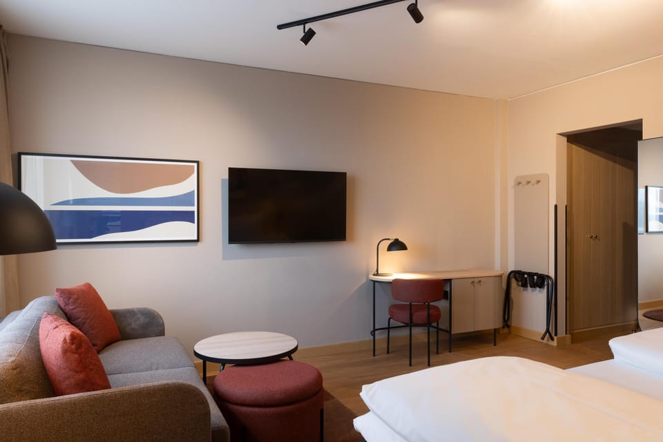 Junior Suite with access to lounge "Living Room" | In-room safe, laptop workspace, blackout drapes, iron/ironing board