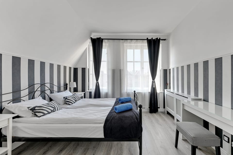 Comfort Apartment, City View | Blackout drapes, iron/ironing board, WiFi (free), bed sheets