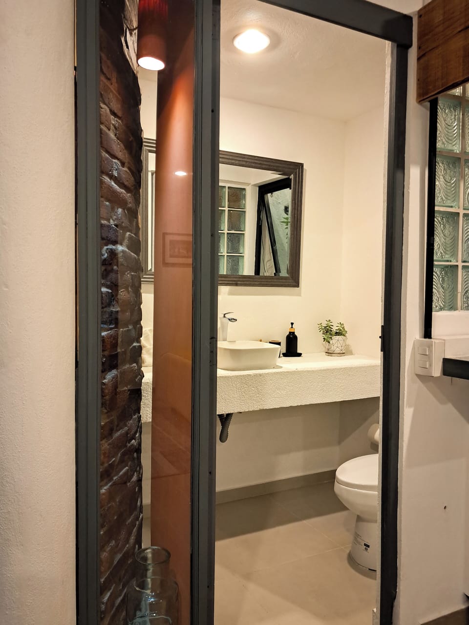 Deluxe Quadruple Room, Courtyard View | Bathroom | Shower, hair dryer (on request), towels, soap