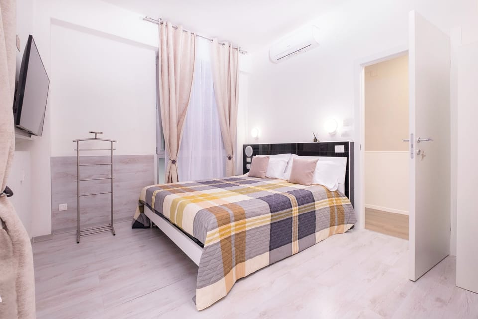 Desk, laptop workspace, blackout drapes, soundproofing