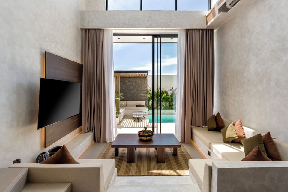 Deluxe Villa, 2 Bedrooms, Private Bathroom, Pool View | Living area | 32-inch Smart TV with digital channels