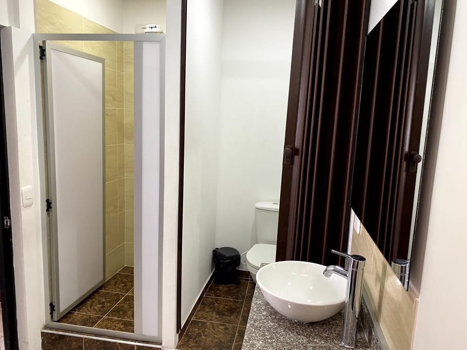 Family Room, Multiple Beds | Bathroom | Shower, towels, soap, toilet paper