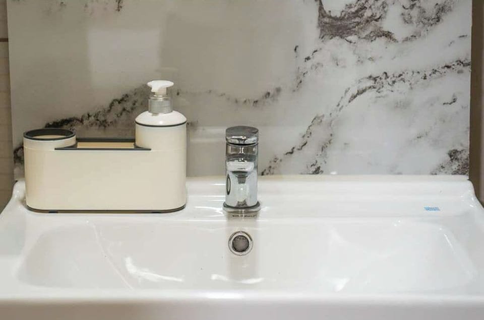 Shower, rainfall showerhead, towels, soap