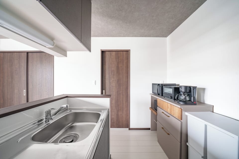 Apartment | Private kitchen | Fridge, microwave, stovetop, rice cooker