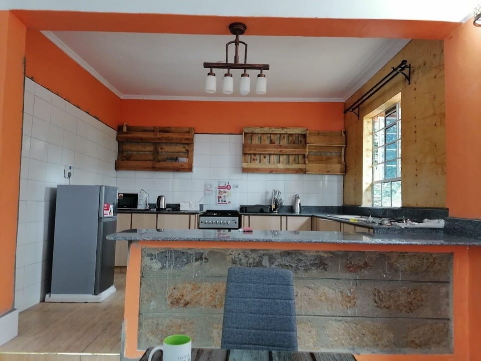 Deluxe Cottage, Balcony, Garden View | Private kitchen | Fridge, microwave, cookware/dishes/utensils