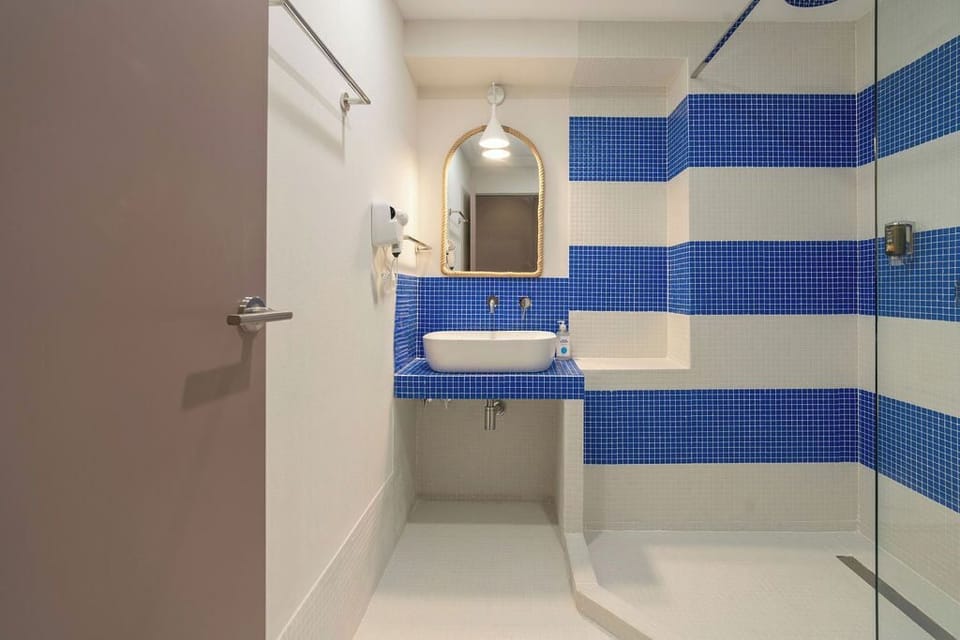 Double Room | Bathroom | Shower, hair dryer, towels