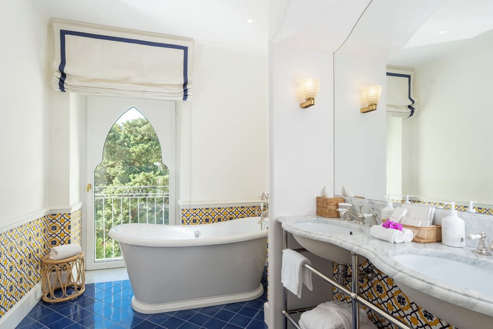 Suite, Sea View (Lighthouse) | Bathroom | Rainfall showerhead, free toiletries, hair dryer, slippers