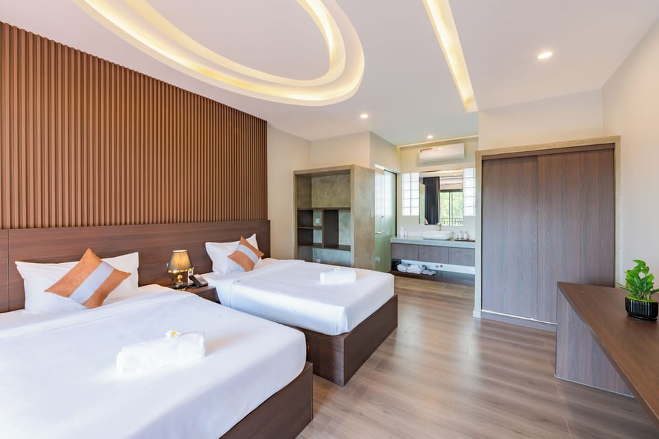 Deluxe Twin Room, Pool View | Garden view