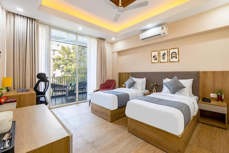 Premium Twin Room, Balcony, City View | In-room safe, desk, laptop workspace, soundproofing