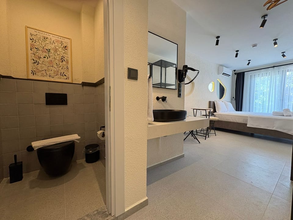 Double Room, Private Bathroom | Bathroom | Shower, free toiletries, hair dryer, slippers