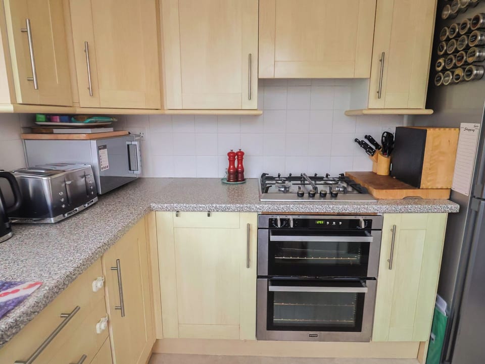 Fridge, microwave, toaster, cookware/dishes/utensils