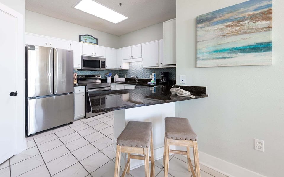 Condo, 2 Bedrooms | Private kitchen | Coffee/tea maker, fridge, oven, stovetop