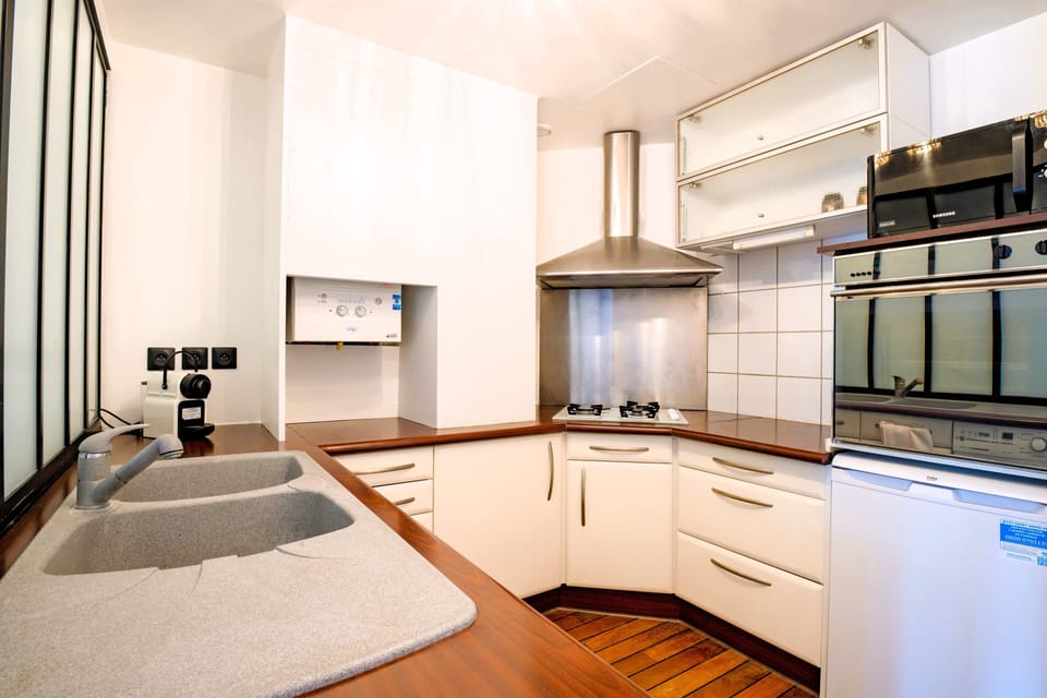 One-Bedroom Apartment with Spa Bath | Private kitchen | Espresso maker, electric kettle, toaster, dining tables
