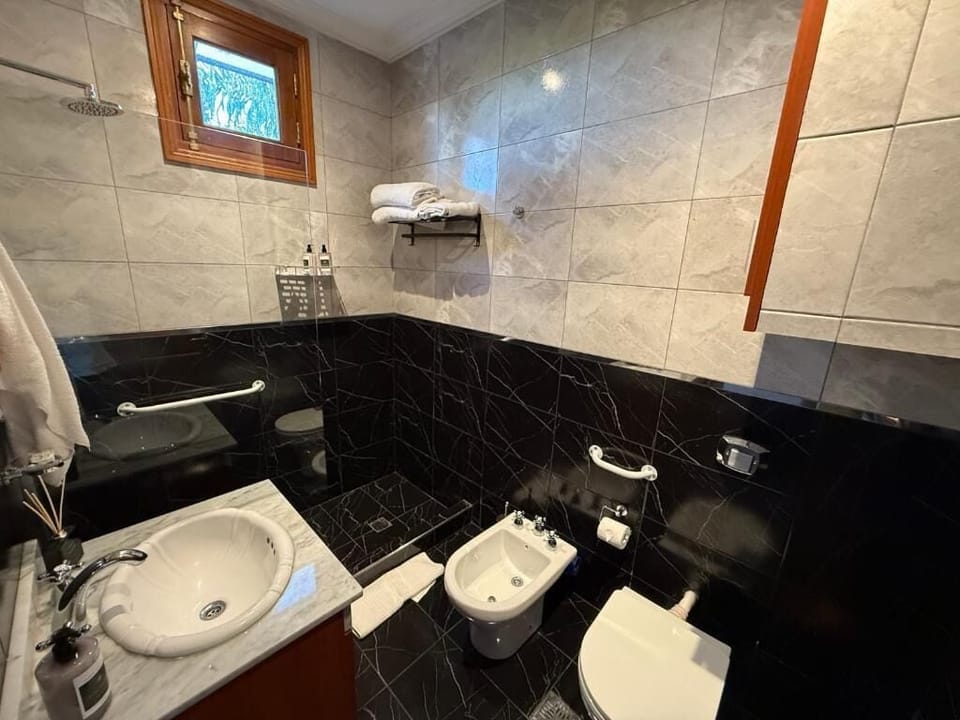 Luxury Triple Room, Patio, Courtyard View | Bathroom | Bathrobes, bidet