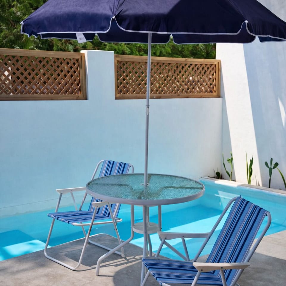 Apartment, 1 Bedroom, Kitchen, Pool View | Property grounds