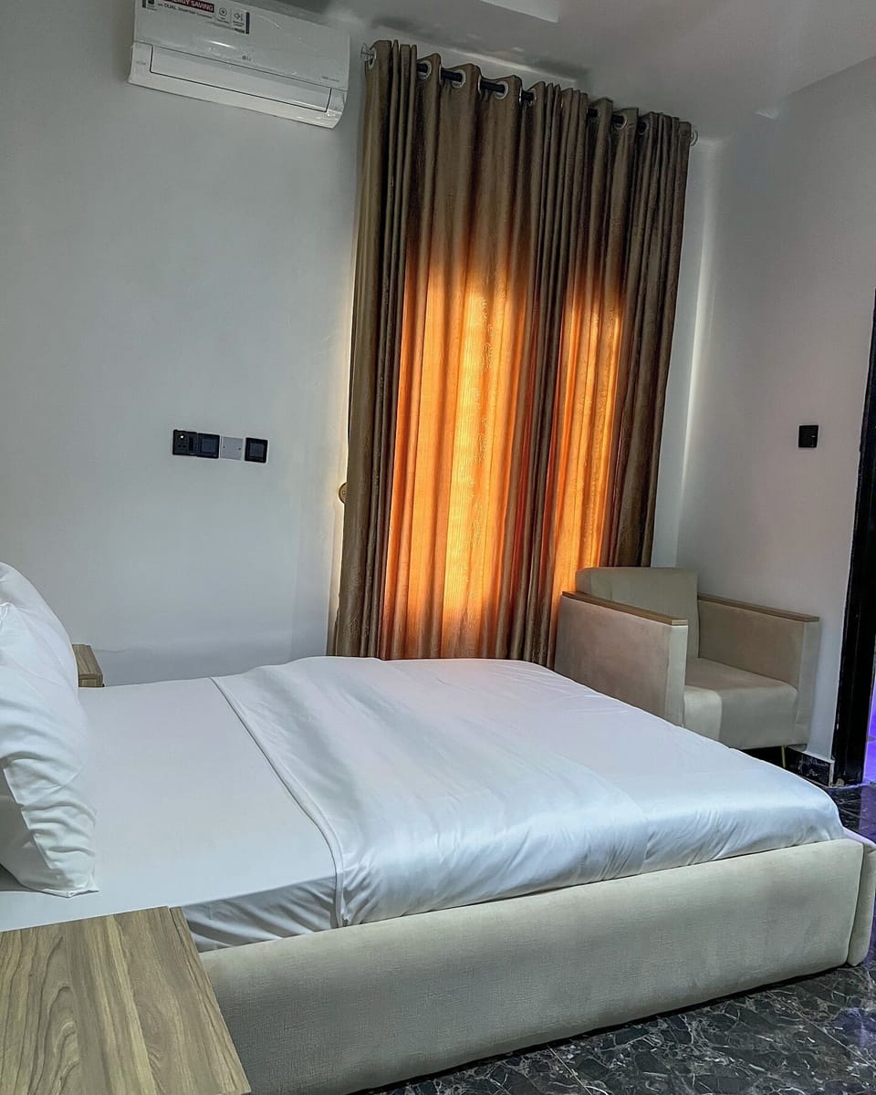 Economy Room, Balcony, City View | In-room safe, desk, laptop workspace, blackout drapes