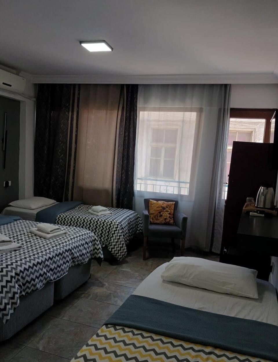 Classic Quadruple Room, City View | Free WiFi