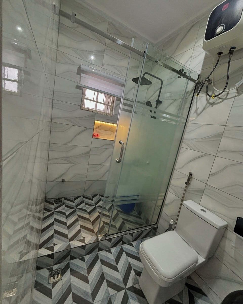 Family Room, Balcony, City View | Bathroom | Free toiletries, hair dryer, towels, soap