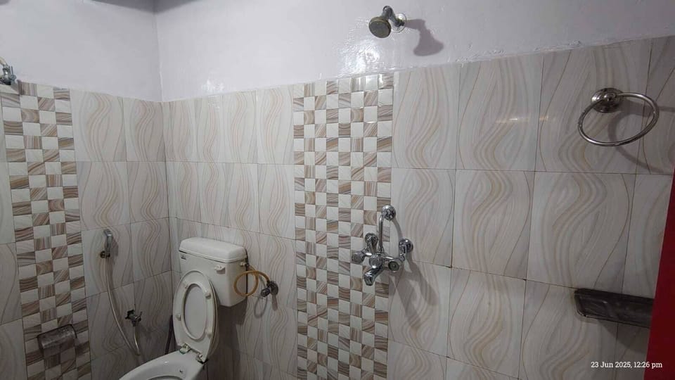Shower, slippers, towels, soap