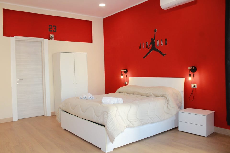 Deluxe Quadruple Room, Housekeeping, City View | Desk, laptop workspace, blackout drapes, free WiFi