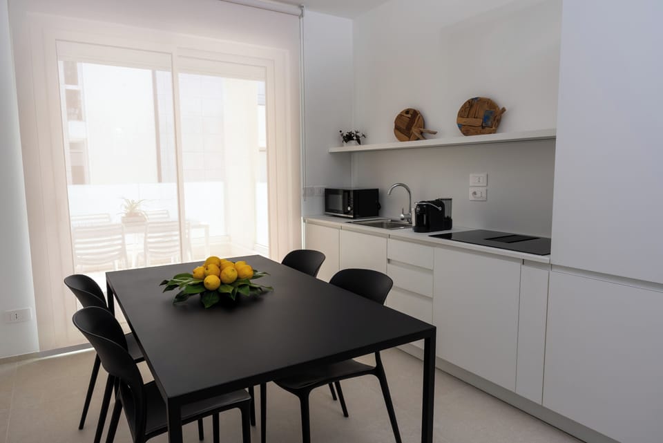 Comfort Apartment | Private kitchen | Full-size fridge, microwave, stovetop, dishwasher