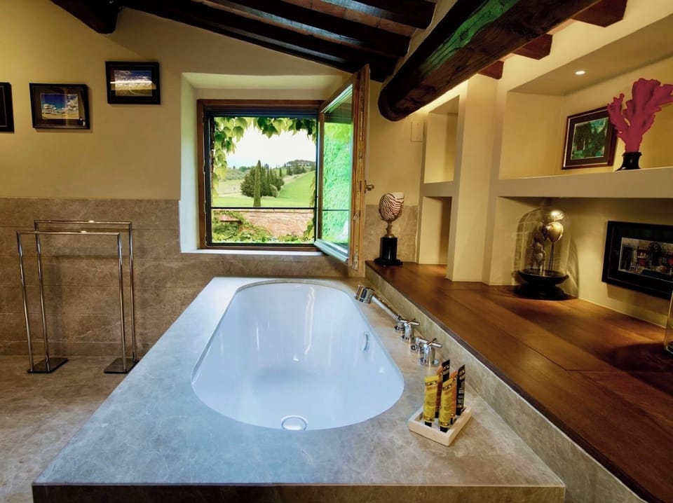Suite, 2 Bedrooms | Bathroom | Free toiletries, hair dryer, bathrobes, slippers