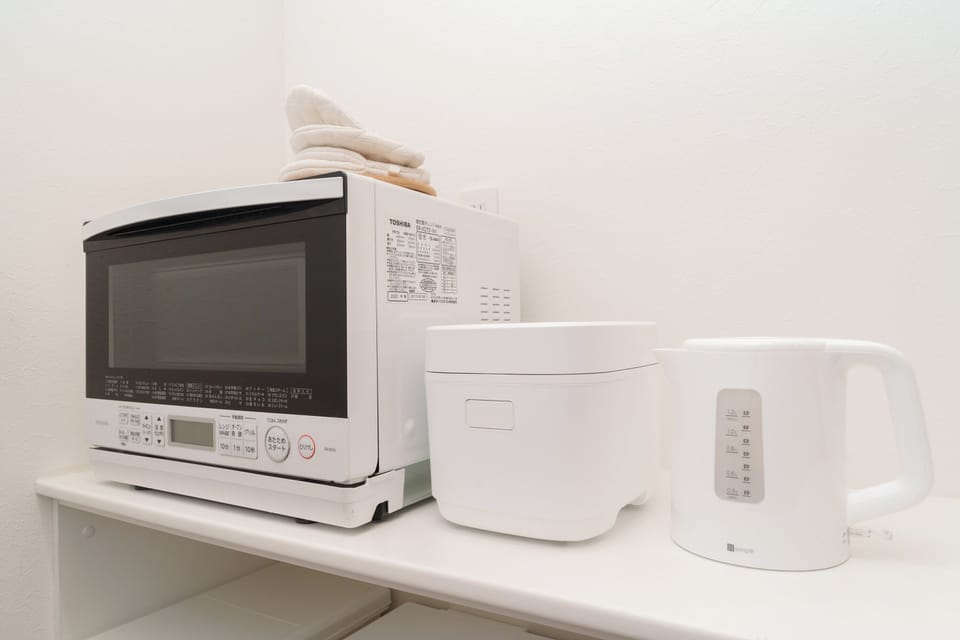 Comfort Condo, Non Smoking | Private kitchen | Full-size fridge, microwave, stovetop, rice cooker