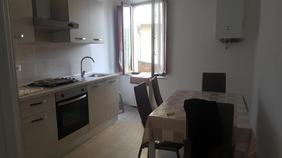 Basic Double Room, Patio, City View | Private kitchen | Full-size fridge, microwave, stovetop, cookware/dishes/utensils