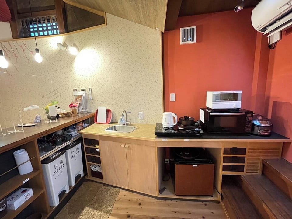 Fridge, microwave, cookware/dishes/utensils, cleaning supplies