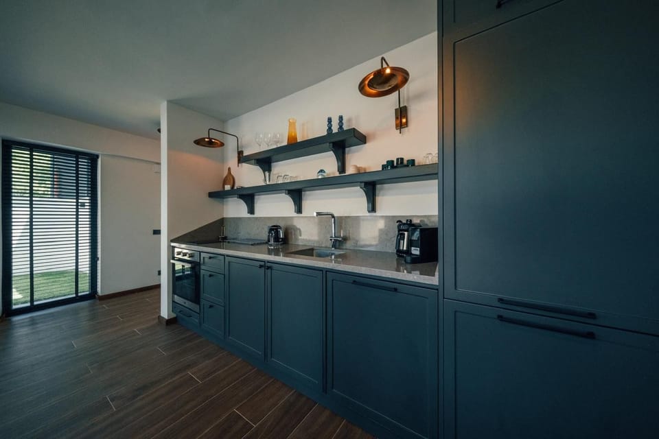 Villa, Patio, Pool View | Private kitchen | Mini-fridge, microwave, stovetop, cookware/dishes/utensils