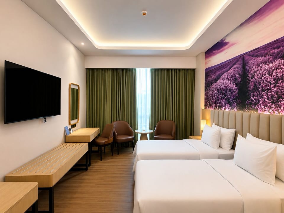 Deluxe Double or Twin Room | Minibar, laptop workspace, bed sheets