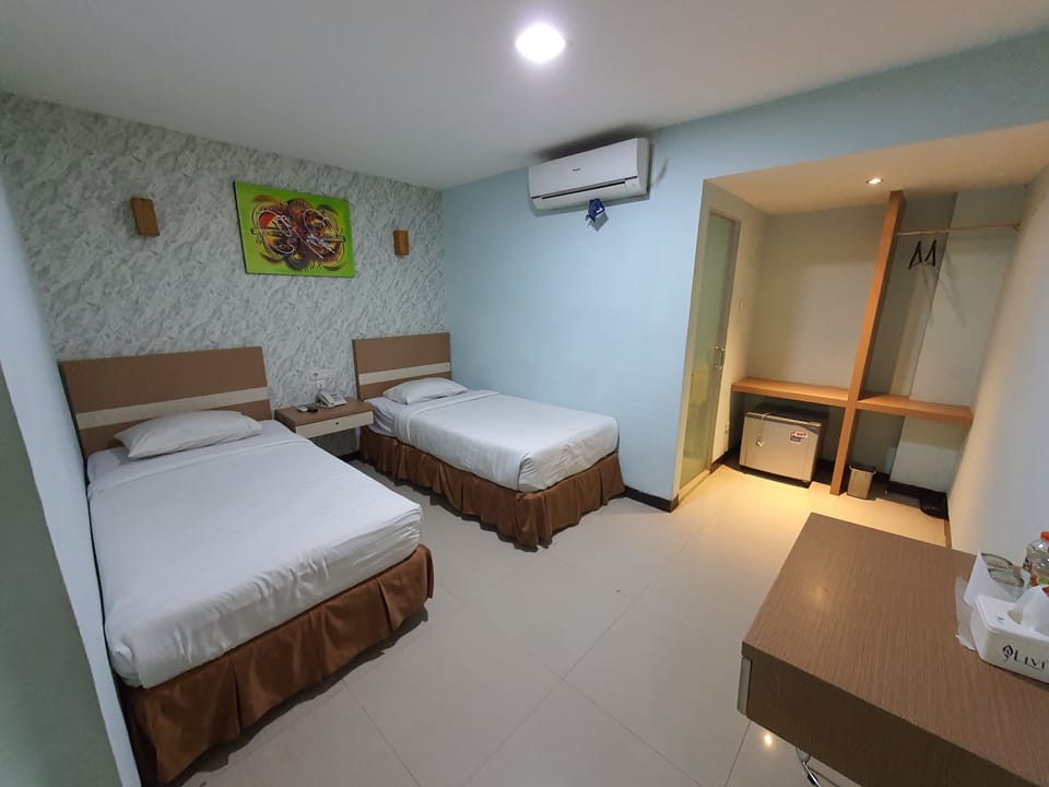 Deluxe Room | Desk, WiFi (free), bed sheets