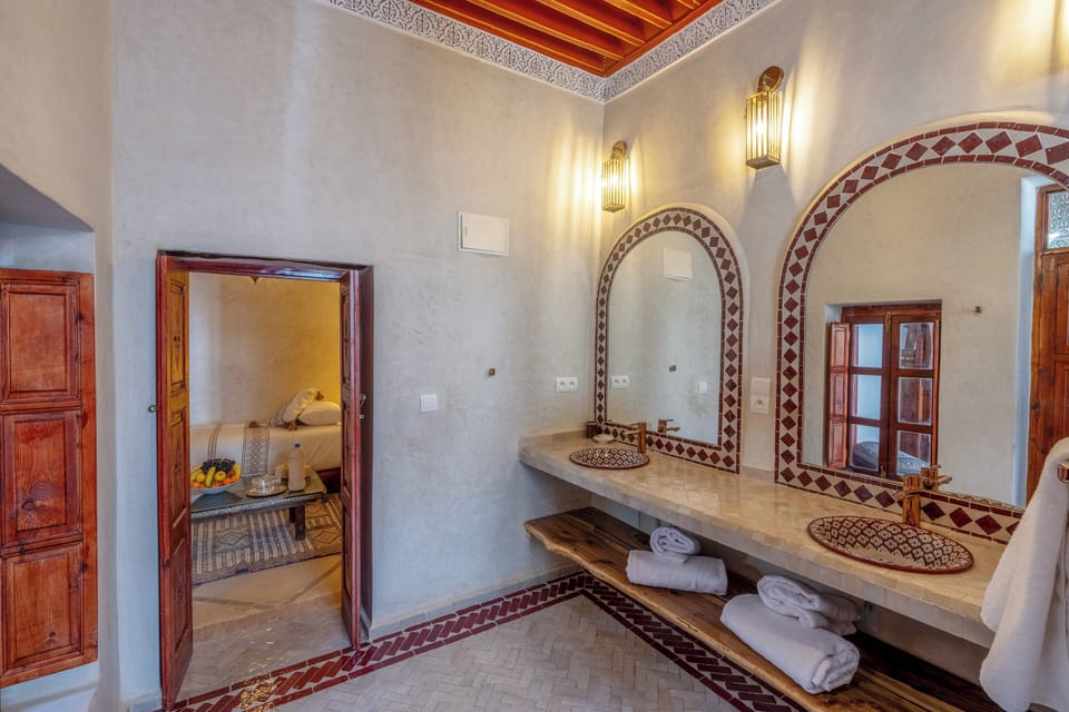 Premium Quadruple Room, Courtyard View | Bathroom | Shower, hair dryer, towels, soap