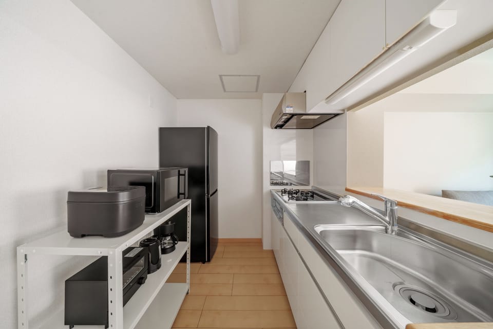 Apartment | Private kitchen | Fridge, microwave, stovetop, rice cooker
