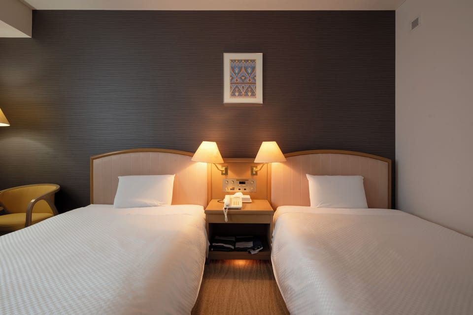Twin Room, Non Smoking | Desk, laptop workspace, free WiFi, bed sheets