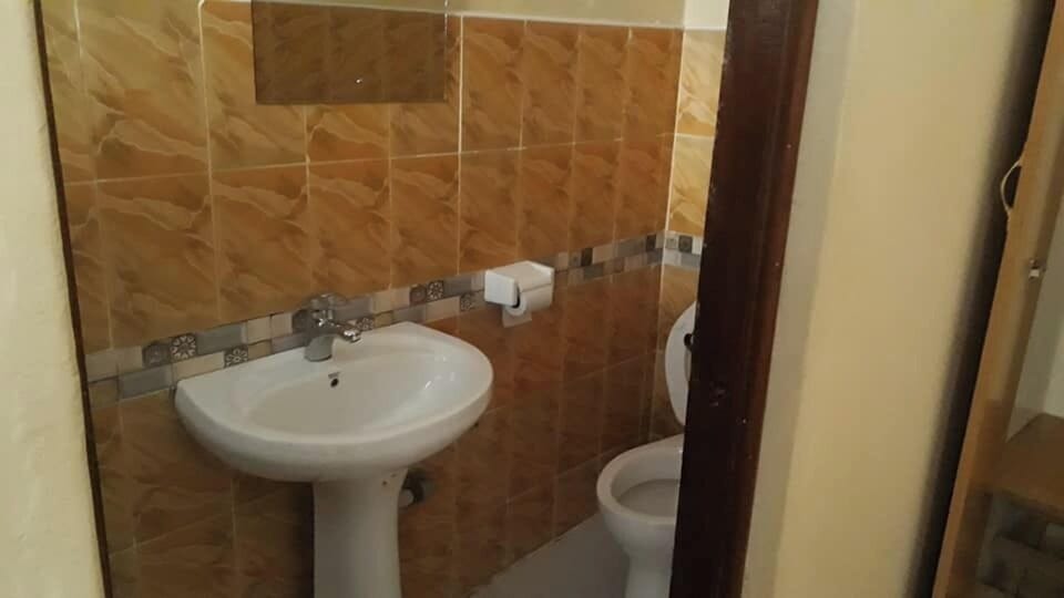 Deluxe Double Room | Bathroom | Shower, slippers, towels, soap