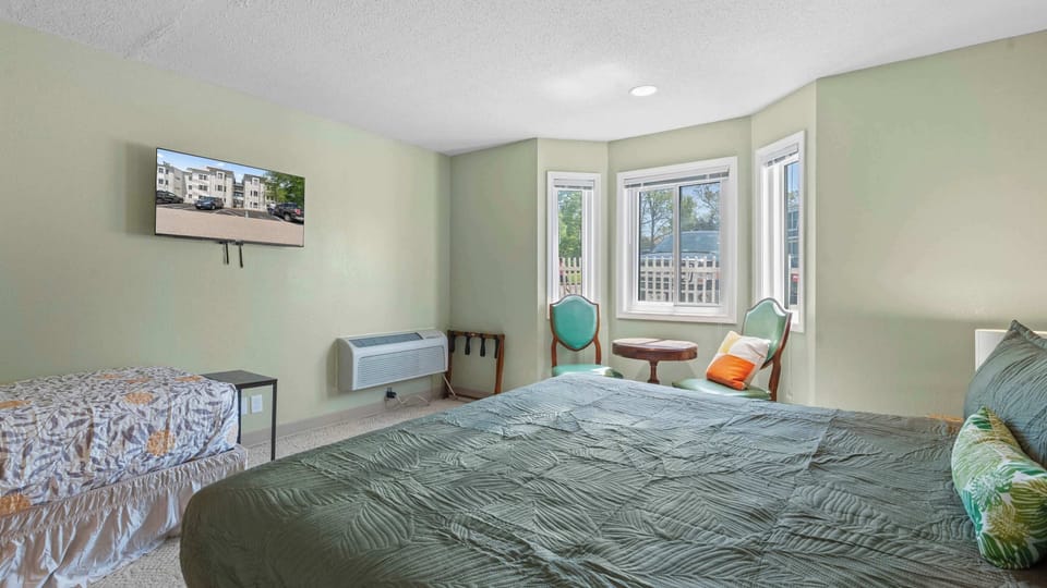 Condo, Multiple Beds, Balcony, Garden View (Have it all) | 2 bedrooms, individually decorated, individually furnished