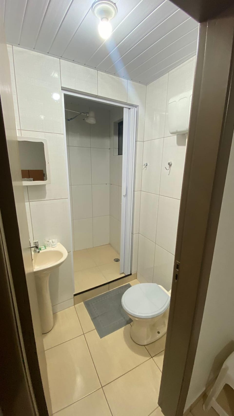 Basic Double Room, Balcony, City View | Bathroom | Shower, towels, soap, shampoo