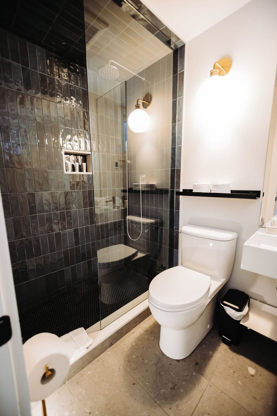 Shower, rainfall showerhead, designer toiletries, hair dryer