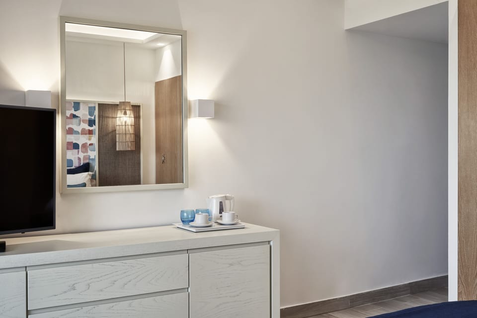 Junior Suite Inland View | Free minibar, in-room safe, desk, blackout drapes